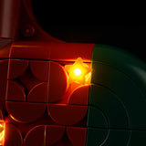 Close-up of a warm star-shaped light near the toe of Christmas Stocking 40958