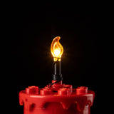 Close-up of the warm illuminated candle flame on Christmas Table Decoration 40743