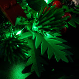 Green foliage detail with installed lighting on Christmas Table Decoration 40743