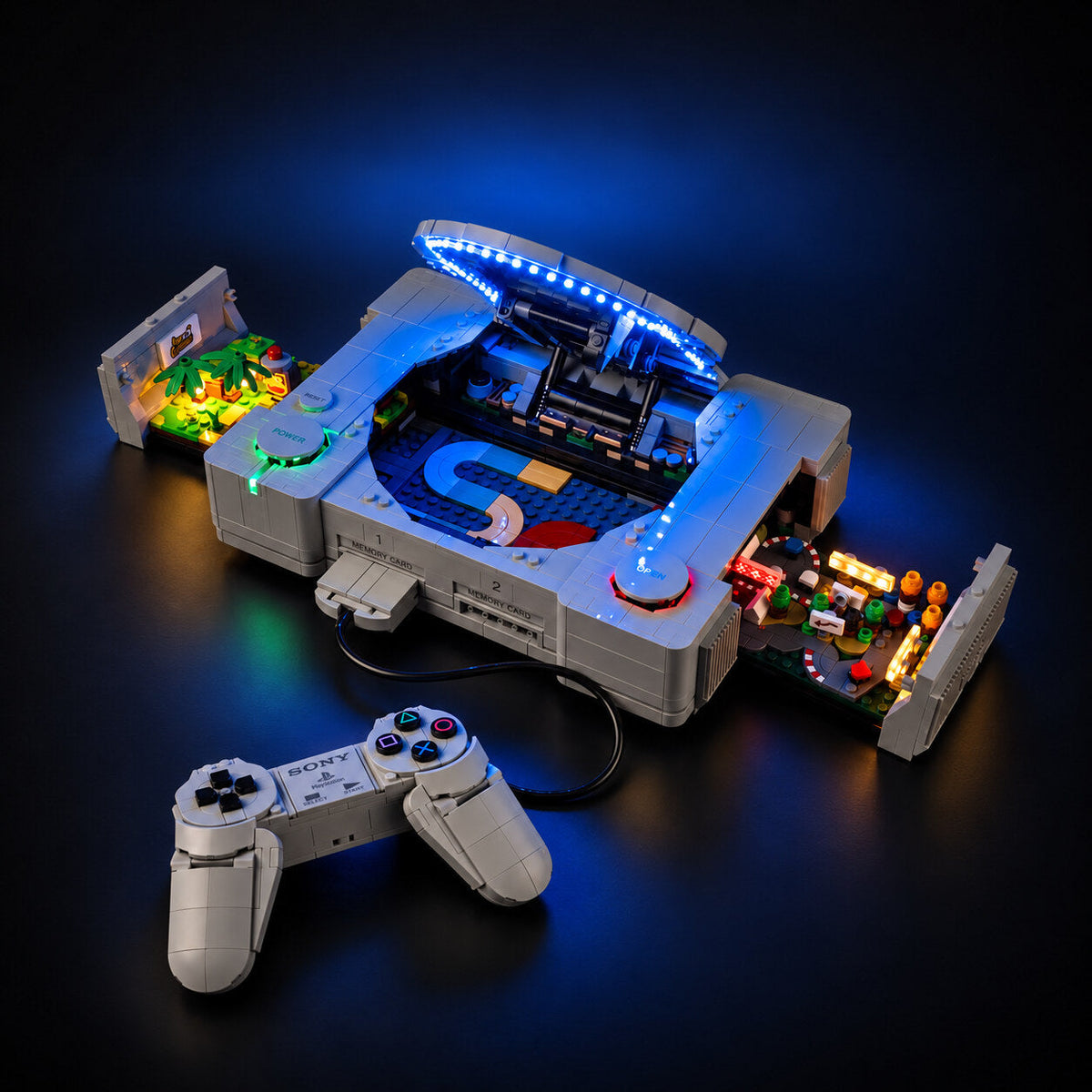 LEGO PlayStation 72306 model with blue lid lighting and illuminated game scenes
