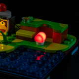 Close-up of a red illuminated detail in the LEGO PlayStation 72306 jungle scene