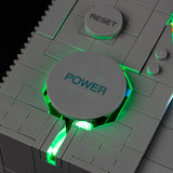 Close-up of green lighting around the touch power button on LEGO PlayStation 72306