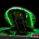 Close-up of green LED lighting around the open lid of LEGO PlayStation 72306