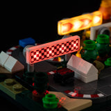Close-up of illuminated racing arrows and red checkerboard sign for LEGO PlayStation 72306